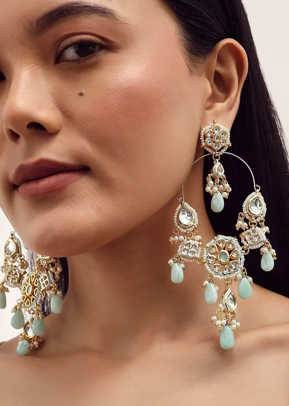 Blue And Gold Danglers With Kundan Work In Mix Metal
