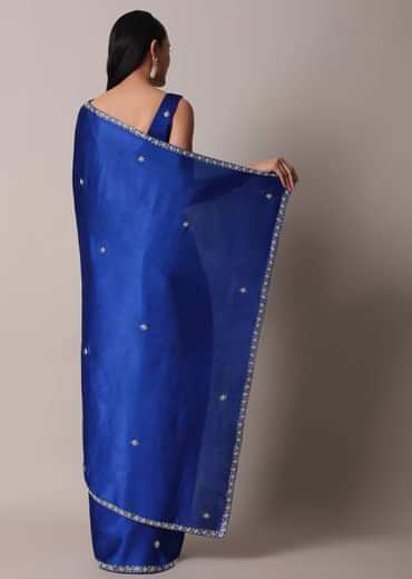 Blue Satin Saree With Stone Embellished Border And Unstitched Blouse Piece