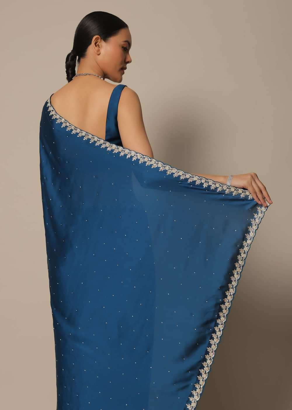 Blue Satin Saree With Stone Studded Border And Unstitched Blouse Piece