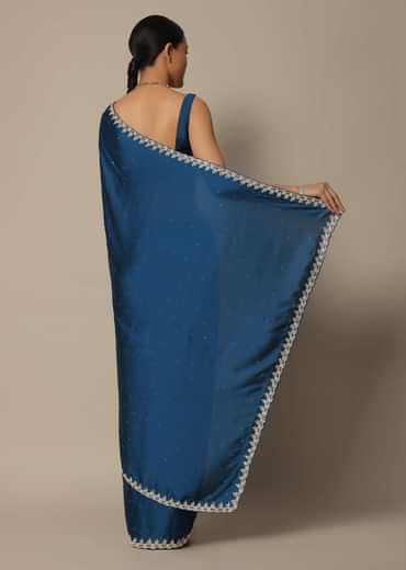 Blue Satin Saree With Stone Studded Border And Unstitched Blouse Piece