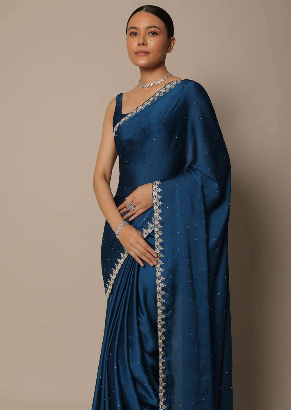 Blue Satin Saree With Stone Studded Border And Unstitched Blouse Piece