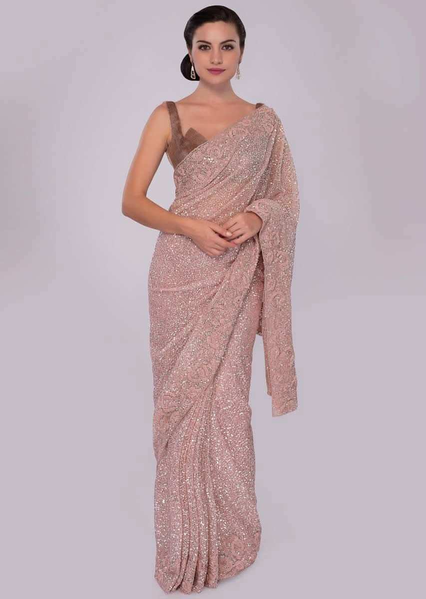 Blush pink hand sequins embroidered saree with spring work border 