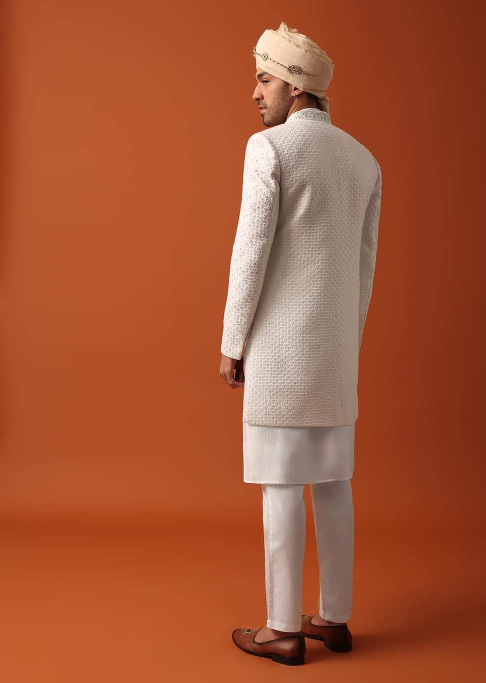Blush Pink Sherwani Adorned with Intricate Embroidery All Over