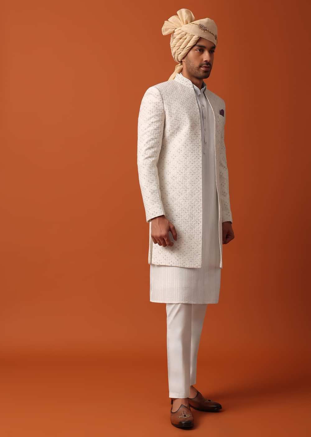 Blush Pink Sherwani Adorned with Intricate Embroidery All Over