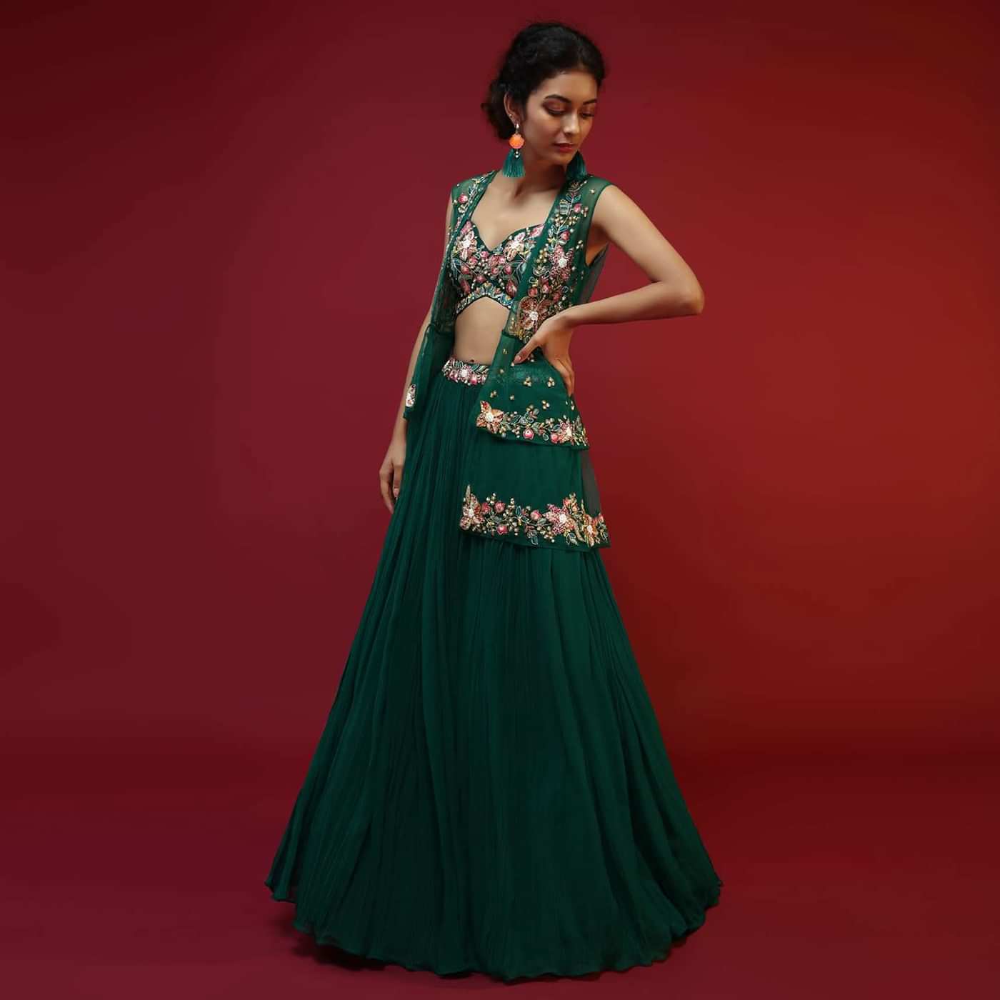 Bottle Green Lehenga Choli And Sleeveless Peplum Jacket Adorned With Colorful Resham And Moti Embroidered Flowers