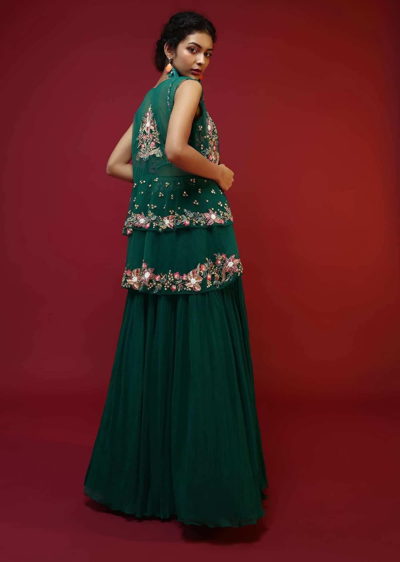 Bottle Green Lehenga Choli And Sleeveless Peplum Jacket Adorned With Colorful Resham And Moti Embroidered Flowers