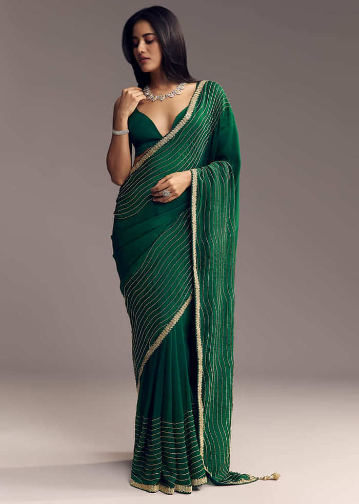 Bottle Green Organza Saree With Scalloped Cut Dana Detailing