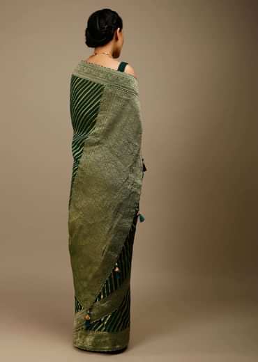 Bottle Green Saree In Georgette With Brocade Woven Diagonal Stripes And Floral Border