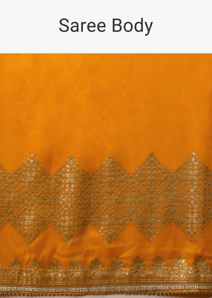 Cadmium Yellow Saree In Dola Silk With Lurex Woven Stripes On The Pallu And Geometric Floral Motifs On The Pleats