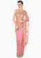 Candy pink saree in net adorn in 3D flower and cut dana jaal embroidery only on Kalki