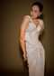 Champagne Drape Gown With Embroidered Shoulder Cape And Tassel Detailing