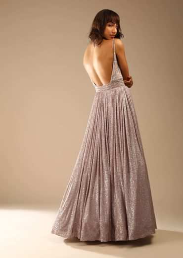 Champagne Gown Embellished In Sequins With Cut Dana Embellished Sheer Net On The Waist And Criss Cross Straps On The Neckline Online - Kalki Fashion