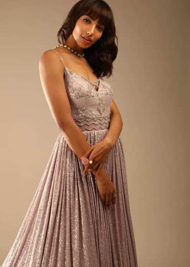 Champagne Gown Embellished In Sequins With Cut Dana Embellished Sheer Net On The Waist And Criss Cross Straps On The Neckline Online - Kalki Fashion