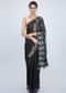 Charcoal grey tussar silk saree with batik printed pallo and bird patch work at the border only on Kalki