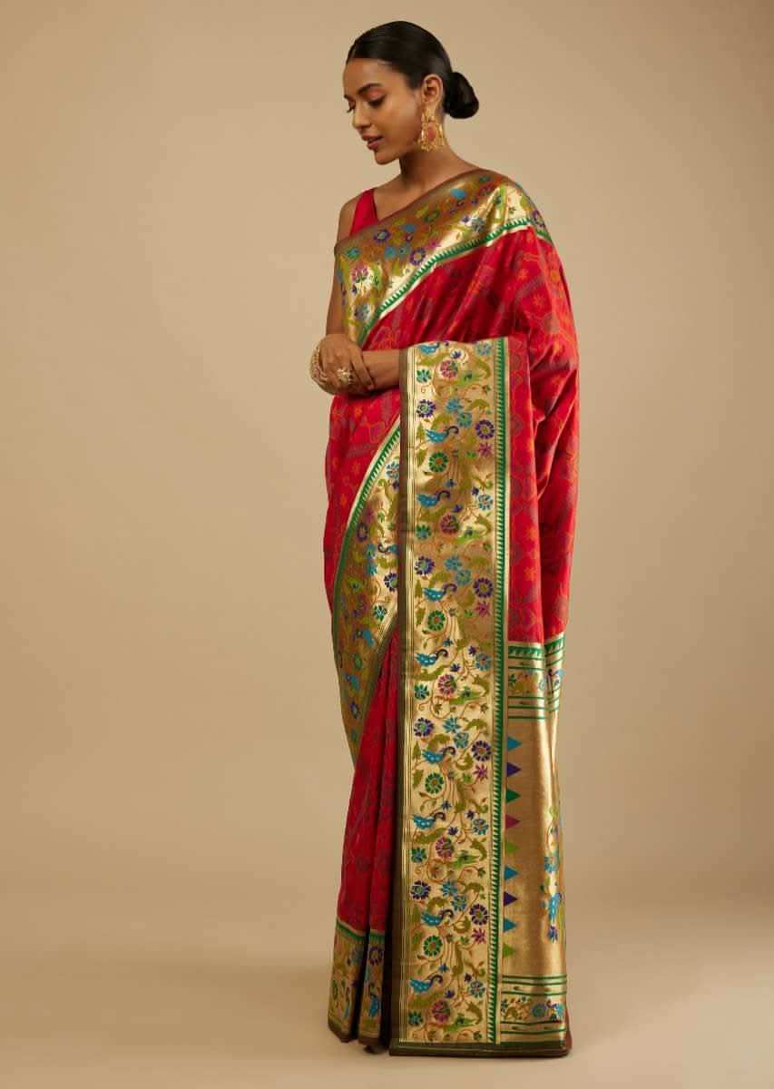 Chilly Red Saree In Silk Blend With Woven Patola Jaal And A Gold Border With Woven Colorful Peacock Motifs