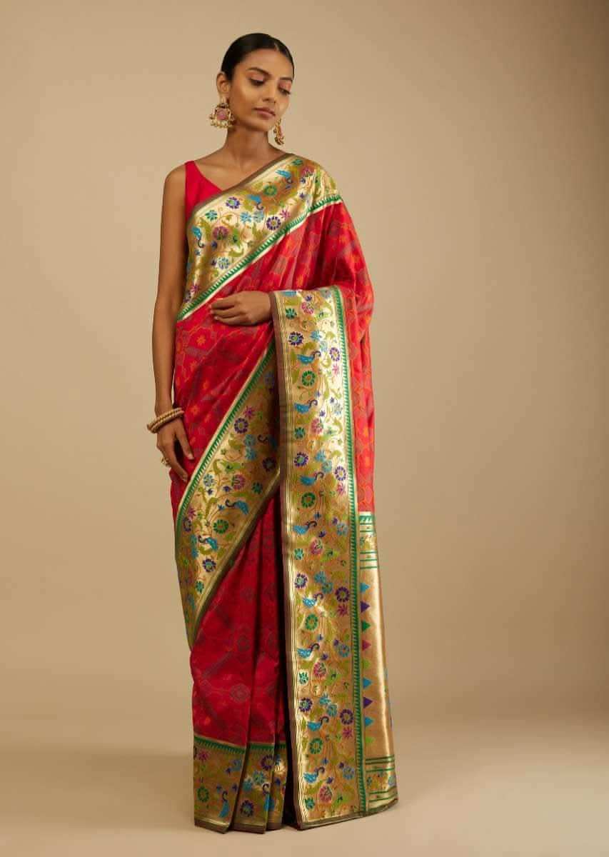 Chilly Red Saree In Silk Blend With Woven Patola Jaal And A Gold Border With Woven Colorful Peacock Motifs