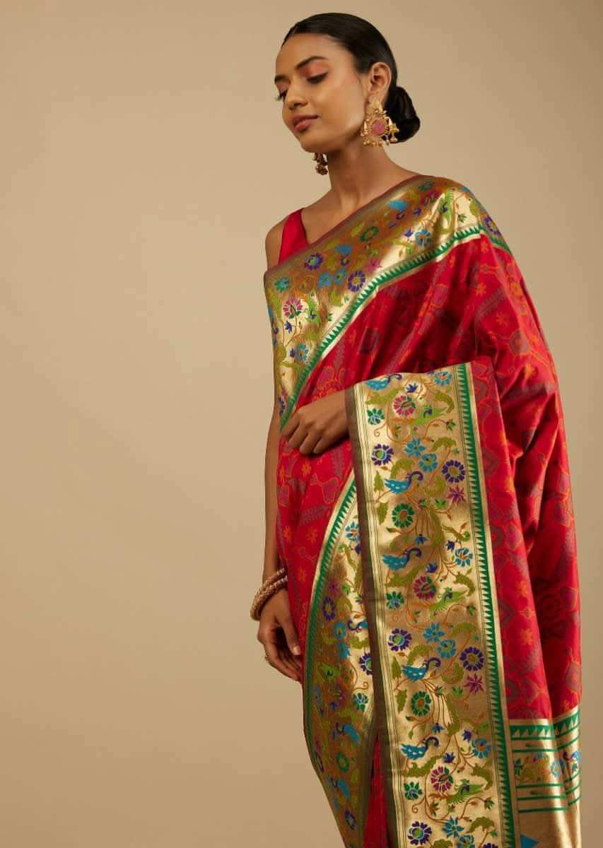 Chilly Red Saree In Silk Blend With Woven Patola Jaal And A Gold Border With Woven Colorful Peacock Motifs