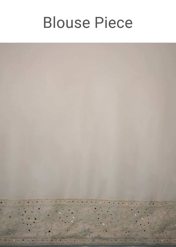 Cloud Cream Saree In Lucknowi Threadwork In A Moroccan Jaal, Mirror Abla And Cut Dana Detailing Work On The Pallu