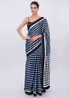 Cobalt blue and white striped linen saree with mirror embroidered border only on Kalki
