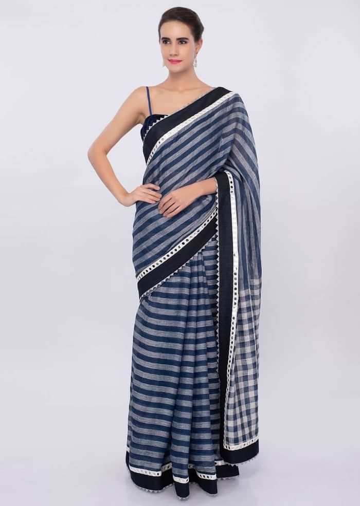 Cobalt blue and white striped linen saree with mirror embroidered border only on Kalki