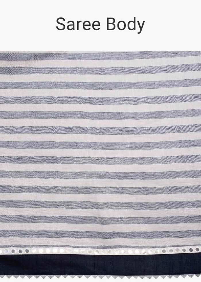 Cobalt blue and white striped linen saree with mirror embroidered border only on Kalki