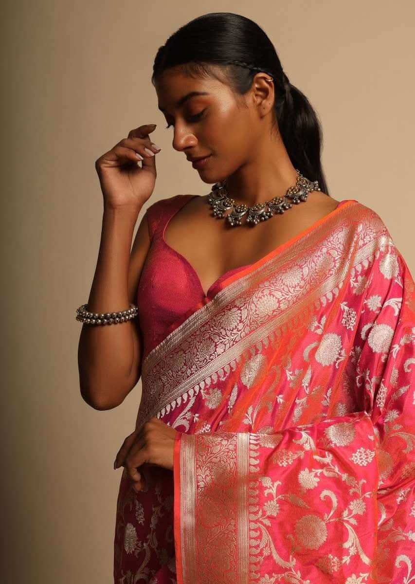 Coral Pink Two Toned Banarasi Saree In Pure Handloom Silk With Woven Floral Jaal And Floral Border Along With Unstitched Blouse Piece
