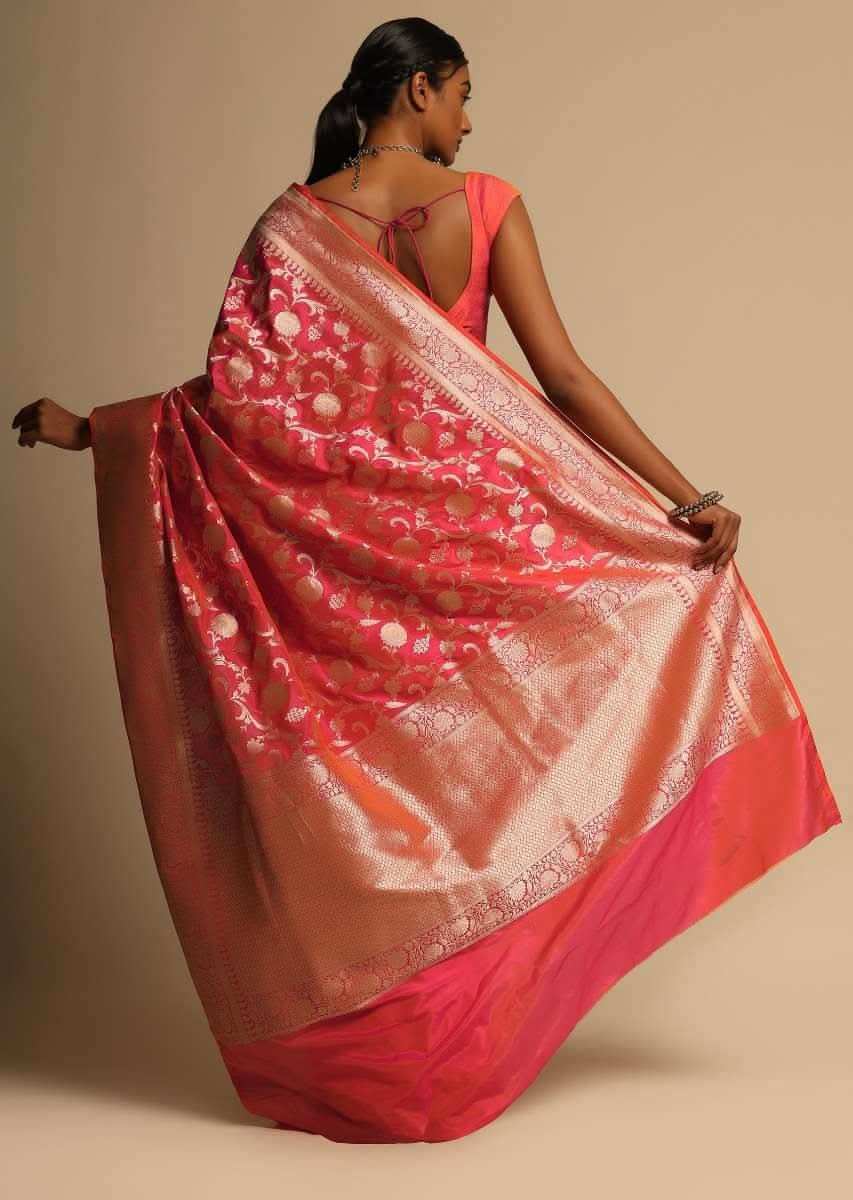 Coral Pink Two Toned Banarasi Saree In Pure Handloom Silk With Woven Floral Jaal And Floral Border Along With Unstitched Blouse Piece