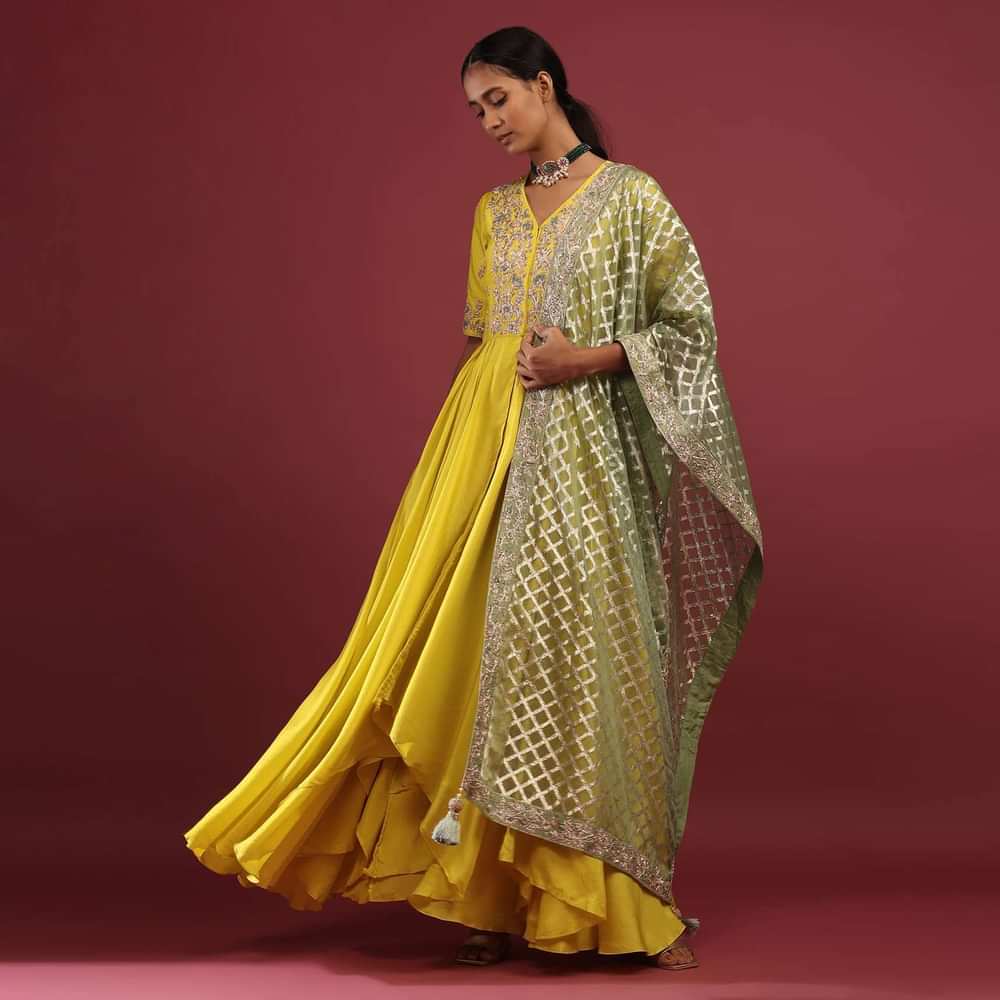 Corn Yellow High Low Anarkali Suit With A Front Slit, Zardosi Embroidered Flowers And Sage Green Lurex Dupatta