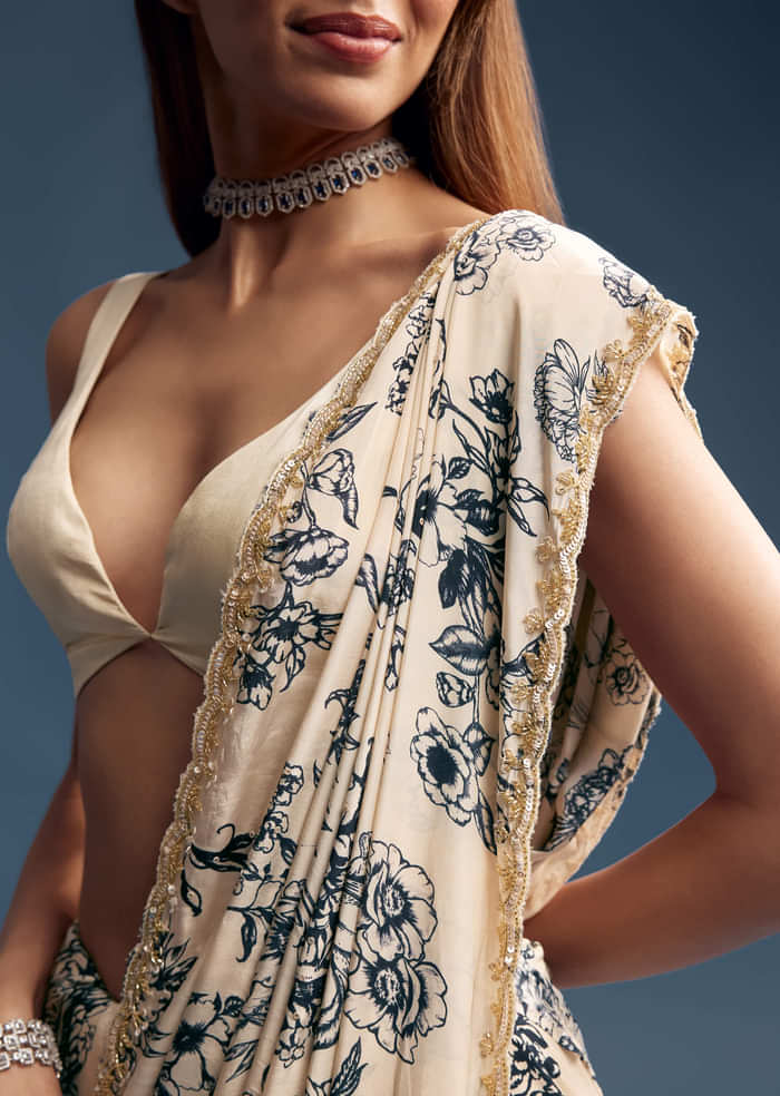 Cream Crepe Saree With Black Floral Print And Embroidery