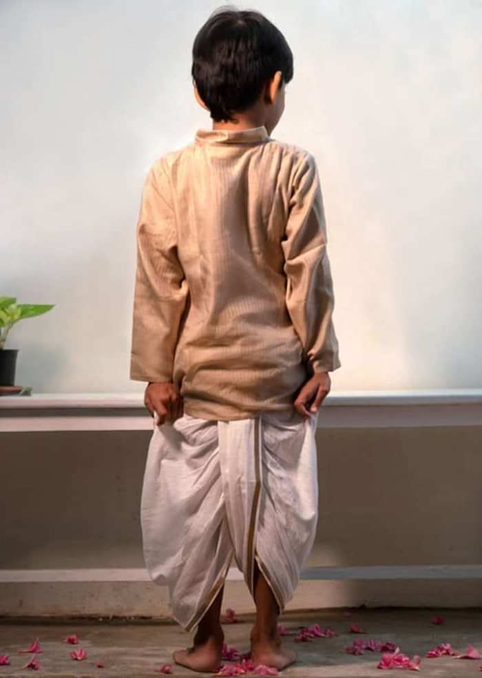 Kalki Boys Cream Kurta In Hand-woven Cotton Silk With Zari Enhanced Placket And Twisted Design At The Neck Love The World Today