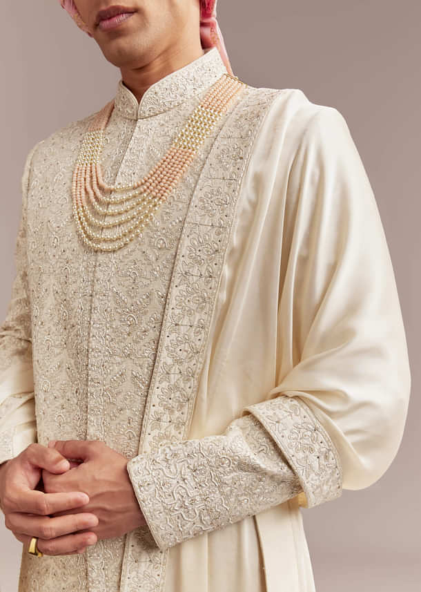 Cream Silk Sherwani For Groom With Floral And Geometric Embroidery