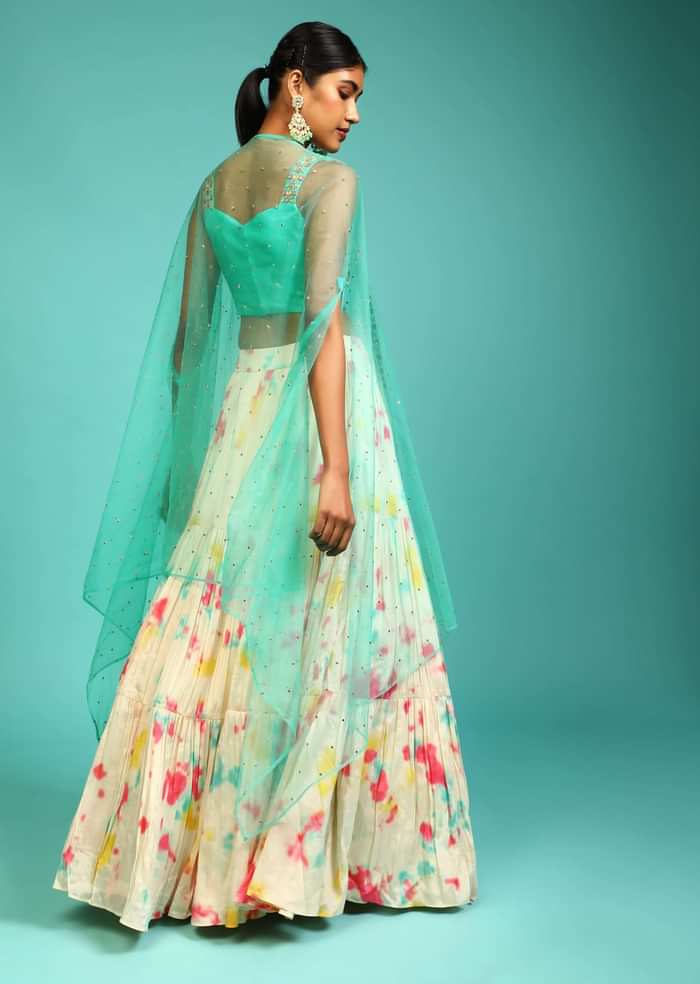 Cream Tie Dye Printed Skirt And Aqua Blue Crop Top Set With Mirror Abla Embroidery And Net Cape Jacket