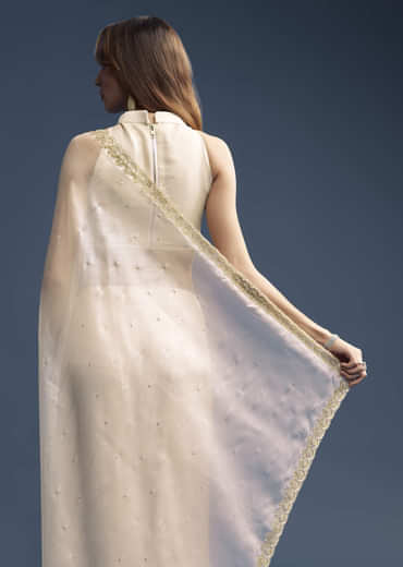 Cream Tissue Saree With Stone And Beaded Embroidery