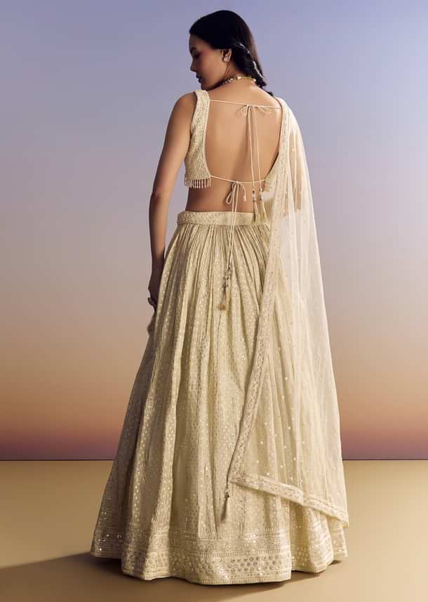 Cream White Banarasi Lehenga Set With Cut Dana Choli