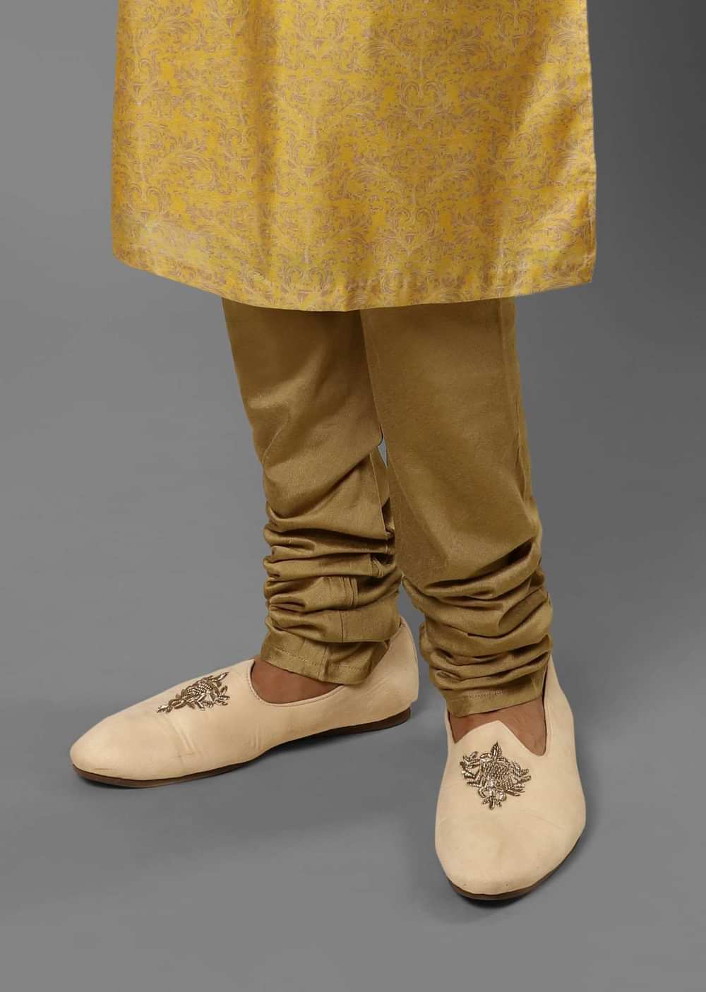 Light Beige Juttis In Suede With Zari Embroidered Motif