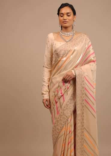 Cream Saree In Dola Silk With Multi Colored Woven Diagonal Stripes And Floral Border