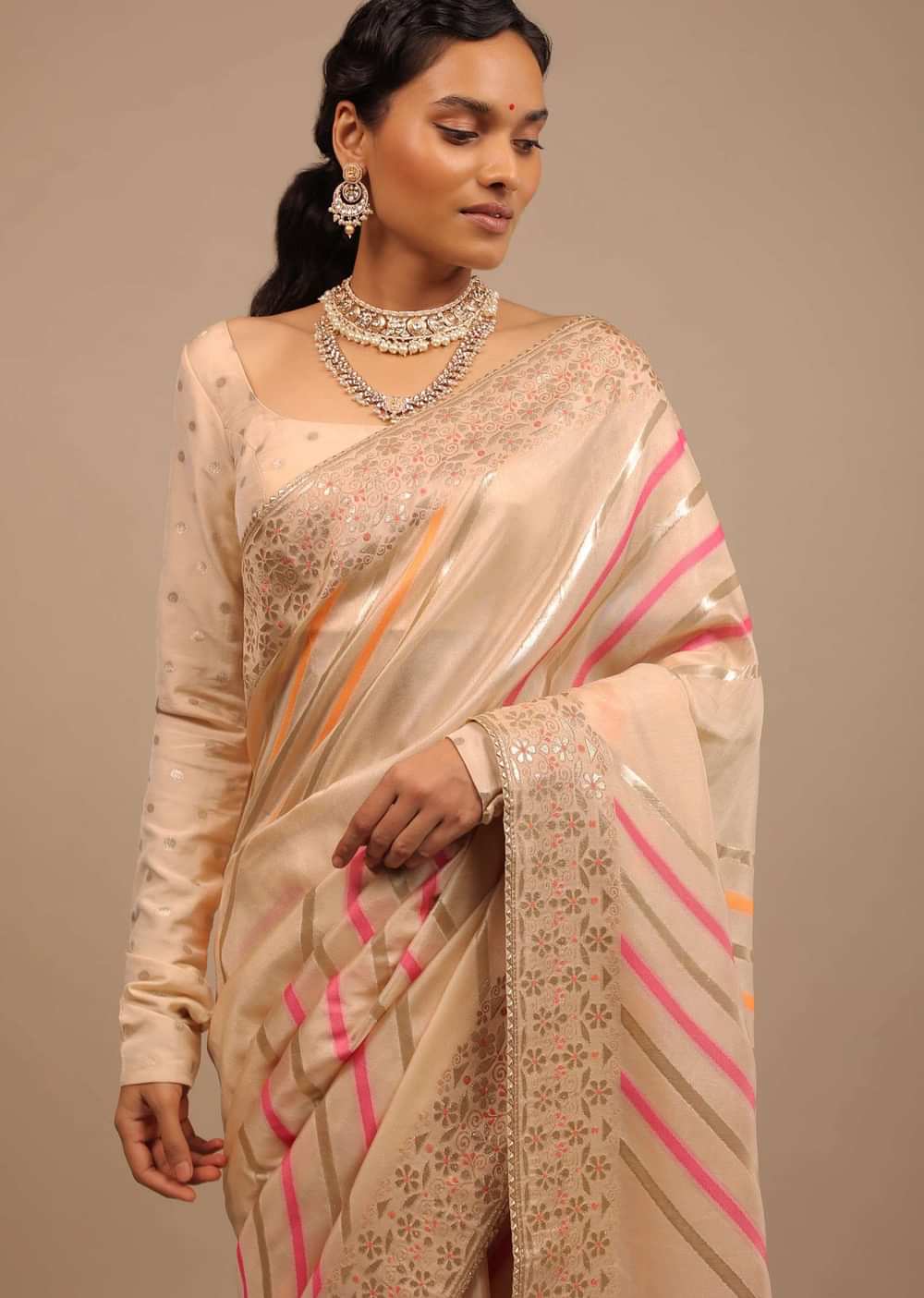 Cream Saree In Dola Silk With Multi Colored Woven Diagonal Stripes And Floral Border