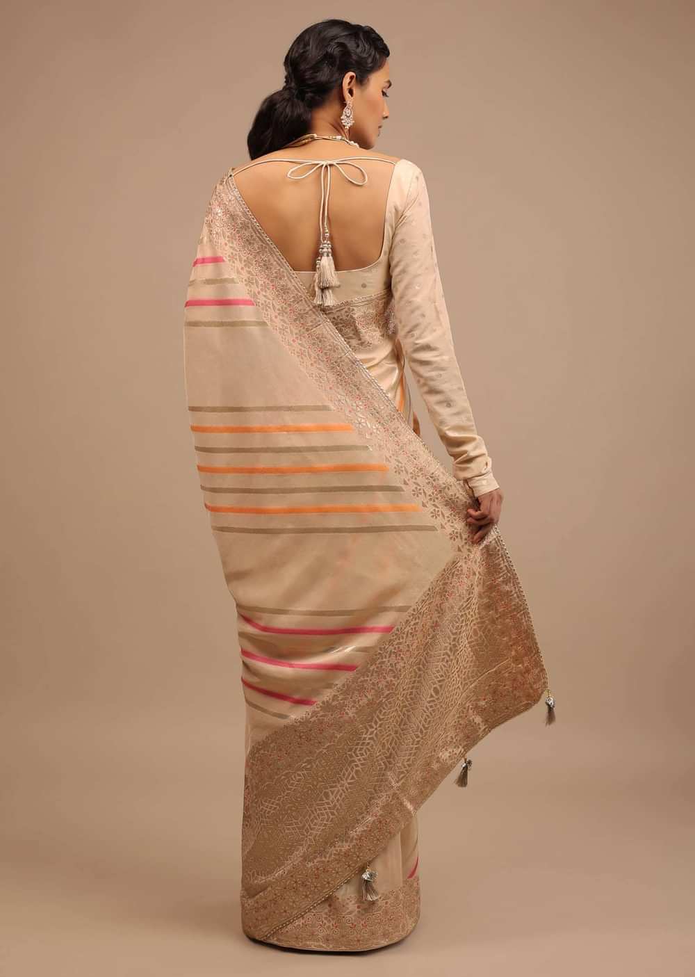 Cream Saree In Dola Silk With Multi Colored Woven Diagonal Stripes And Floral Border