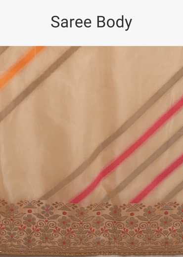 Cream Saree In Dola Silk With Multi Colored Woven Diagonal Stripes And Floral Border