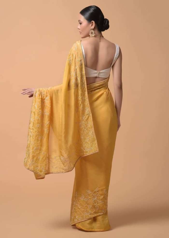 Daffodil Yellow Saree In Organza With Moti And Cut Dana Embellished Floral Design On The Border Online - Kalki Fashion