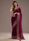Dark Wine Crepe Silk Saree With Zari Border And Contrast Blouse