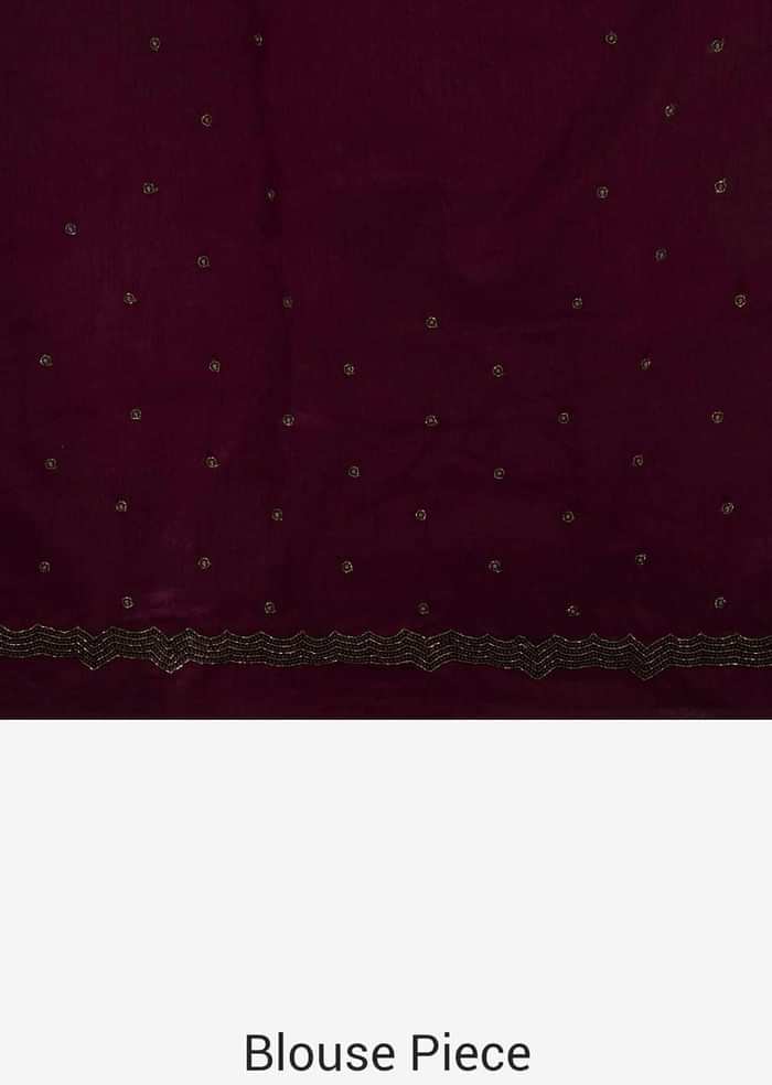 Dark brown saree in crepe with resham embroidery in floral motif only on Kalki