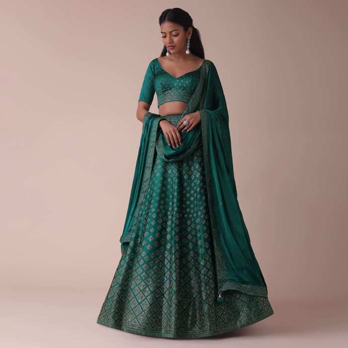 Deep Green Wrinkle Satin Lehenga Embellished In Swarovski