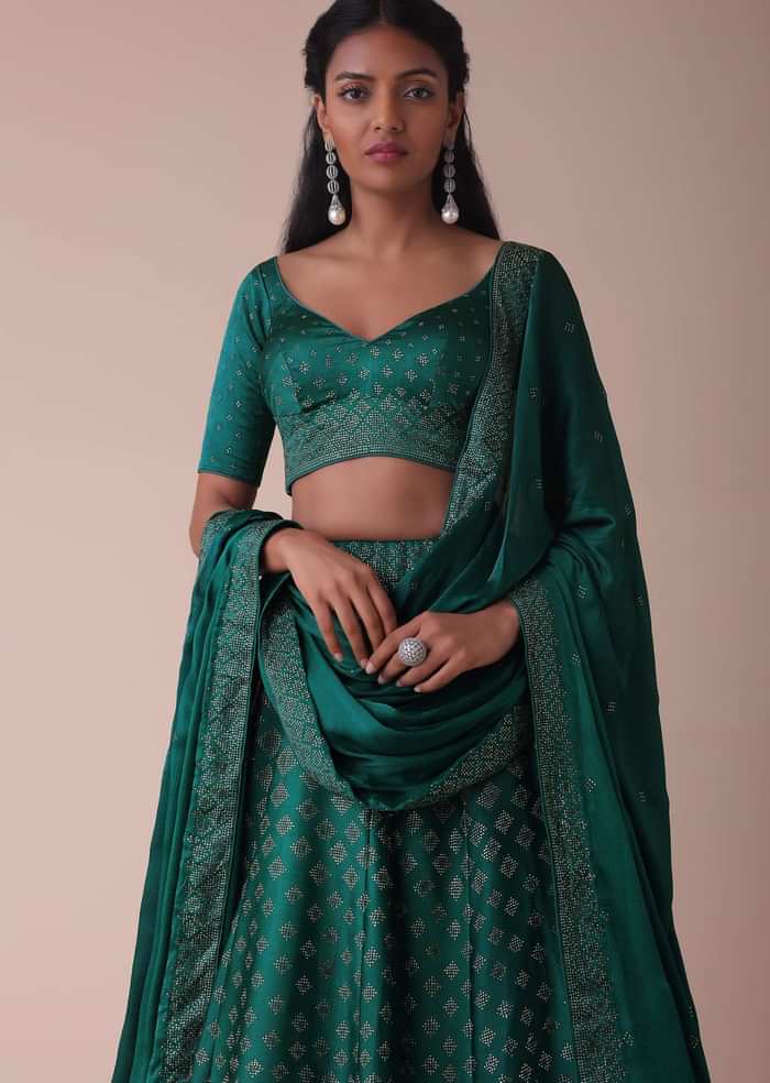 Deep Green Wrinkle Satin Lehenga Embellished In Swarovski