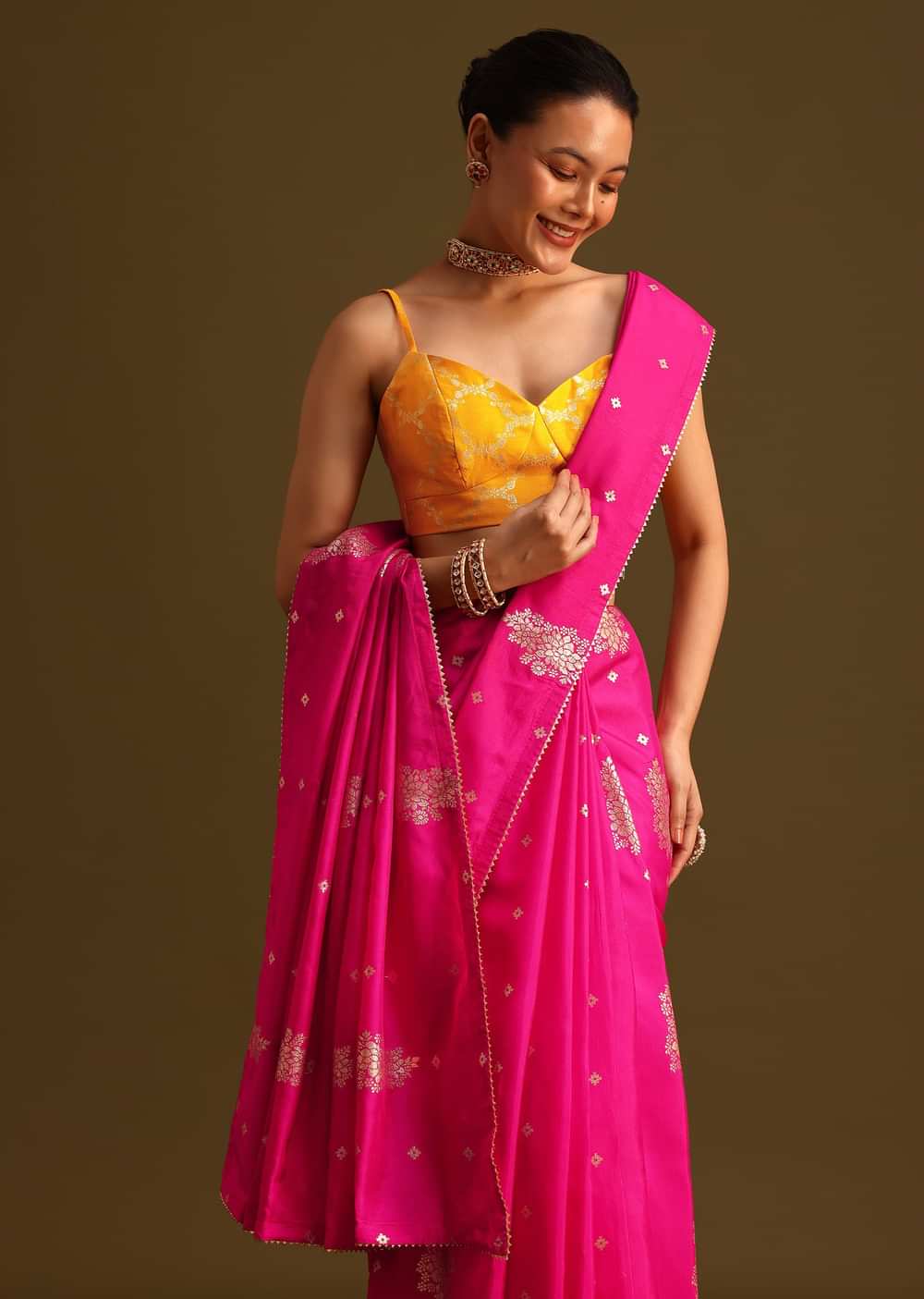 Dola Silk Rani Pink Saree With Lurex Butta And Contrast Unstitched Brocade Blouse