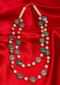 Double layer  white pearl necklace with emerald green flat bead only on Kalki