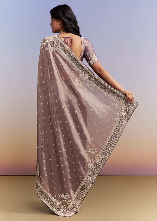 Dusky Lavender Tissue Silk Saree With Heavy Hand Embroidery Dusky Lavender Tissue Silk Saree With Heavy Hand Embroidery