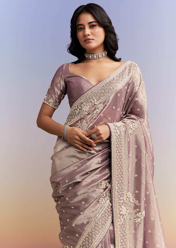 Dusky Lavender Tissue Silk Saree With Heavy Hand Embroidery Dusky Lavender Tissue Silk Saree With Heavy Hand Embroidery