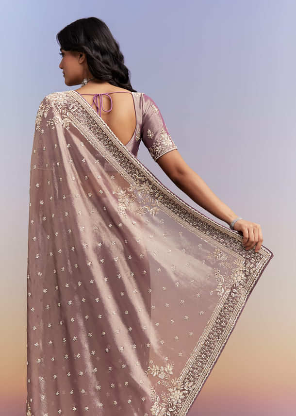 Dusky Lavender Tissue Silk Saree With Heavy Hand Embroidery Dusky Lavender Tissue Silk Saree With Heavy Hand Embroidery