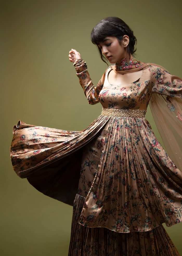 Dusty Peach Sharara Suit In Satin With A Front Slit Peplum Kurti And Moti Accented Waistline